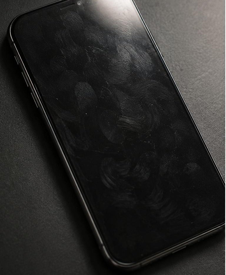 Phone screen covered in greasy fingerprint smears